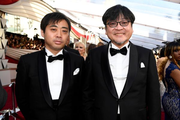 プロデューサーの齋藤優一郎（左）と監督の細田守（右）【Getty Images】