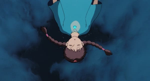 飛行船から落下するも、ペンダントの力により、ゆっくりと降下していくシーン© 1986 Studio Ghibli